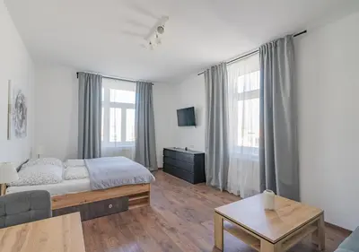 Ein Bett oder Betten in einem Zimmer der Unterkunft New Favoriten - Serviced Apartments