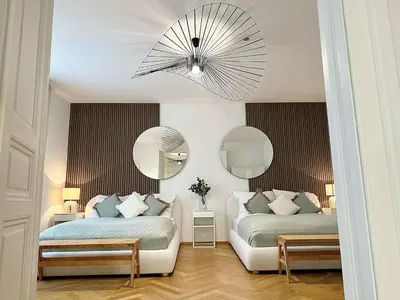 Ein Bett oder Betten in einem Zimmer der Unterkunft Designer Apartment Near Main Station