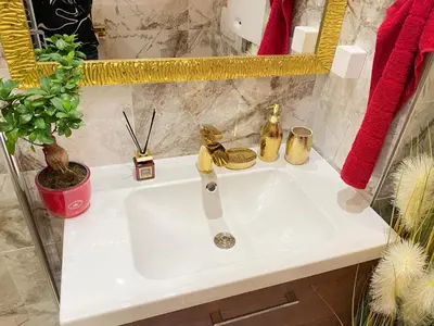 Ein Badezimmer in der Unterkunft ROYAL APARTmENT