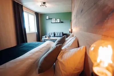 Ein Sitzbereich in der Unterkunft Pur-INN das Gästehaus