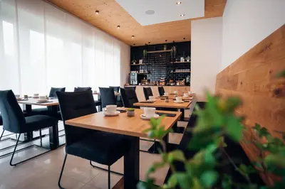 Ein Sitzbereich in der Unterkunft Pur-INN das Gästehaus