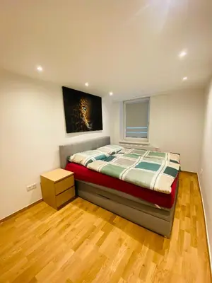 Ein Bett oder Betten in einem Zimmer der Unterkunft NiceApartment BEETHOVENS