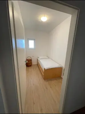 Ein Bett oder Betten in einem Zimmer der Unterkunft 70qm Apartment für sie und ihre Familie