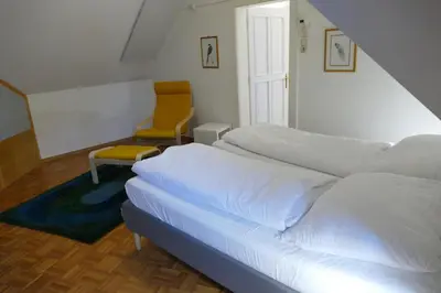 Ein Bett oder Betten in einem Zimmer der Unterkunft Traumhafte Maisonnette mit Kamin