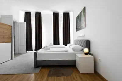 Ein Bett oder Betten in einem Zimmer der Unterkunft Apartments 4 you
