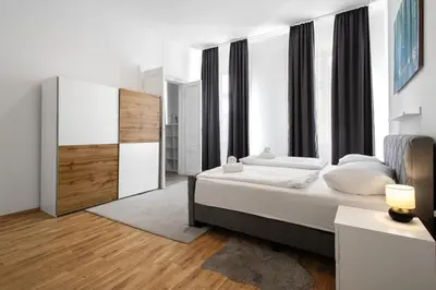 Ein Bett oder Betten in einem Zimmer der Unterkunft Apartments 4 you