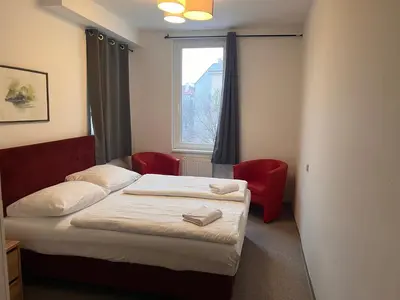 Ein Bett oder Betten in einem Zimmer der Unterkunft Hotel Astral Vienna