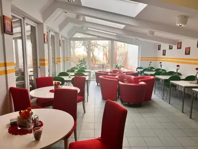 Ein Restaurant oder anderes Speiselokal in der Unterkunft Hotel Astral Vienna