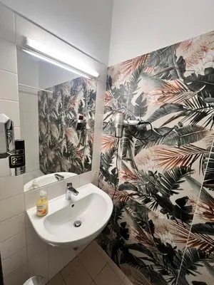 Ein Badezimmer in der Unterkunft Hotel Astral Vienna