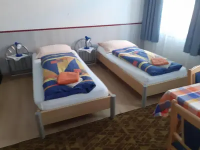 Ein Bett oder Betten in einem Zimmer der Unterkunft HappyHostel