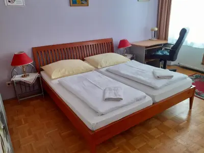 Ein Bett oder Betten in einem Zimmer der Unterkunft HappyHostel