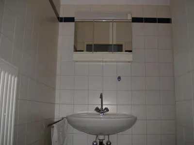 Ein Badezimmer in der Unterkunft HappyHostel