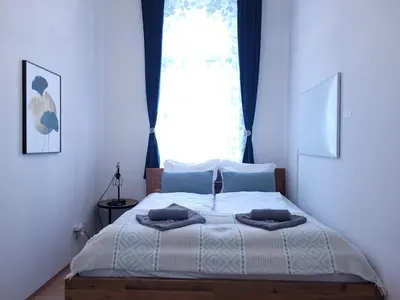 Ein Bett oder Betten in einem Zimmer der Unterkunft 3 Bedrooms - 72sqm - 15 min. City Center