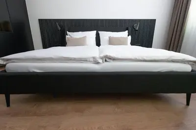 Ein Bett oder Betten in einem Zimmer der Unterkunft EDELHOF room