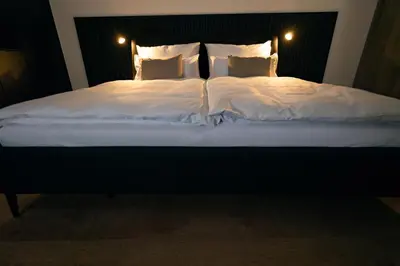 Ein Bett oder Betten in einem Zimmer der Unterkunft EDELHOF room