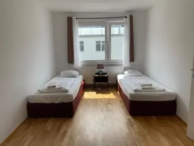 Ein Bett oder Betten in einem Zimmer der Unterkunft Apartment Vienna Buchengasse