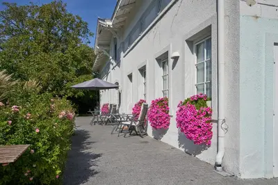 Ein Garten an der Unterkunft Big Apartment in Guesthouse