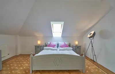 Ein Bett oder Betten in einem Zimmer der Unterkunft Big Apartment in Guesthouse
