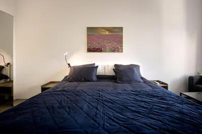 Ein Bett oder Betten in einem Zimmer der Unterkunft Royal Blue Deluxe