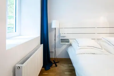 Ein Bett oder Betten in einem Zimmer der Unterkunft Simply Serene