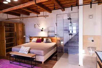 Ein Bett oder Betten in einem Zimmer der Unterkunft Stadtjuwel am Neusiedlersee