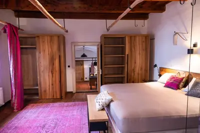 Ein Bett oder Betten in einem Zimmer der Unterkunft Stadtjuwel am Neusiedlersee