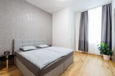Ein Bett oder Betten in einem Zimmer der Unterkunft großzügiges App. 2 Schlafzimmer