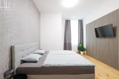 Ein Bett oder Betten in einem Zimmer der Unterkunft großzügiges App. 2 Schlafzimmer