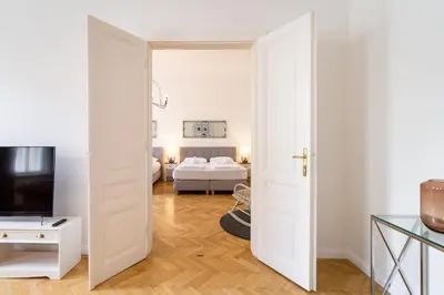 Ein Bett oder Betten in einem Zimmer der Unterkunft Large Luxury Residence Near Townhall & Votivkirche