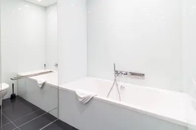 Ein Badezimmer in der Unterkunft Large Luxury Residence Near Townhall & Votivkirche