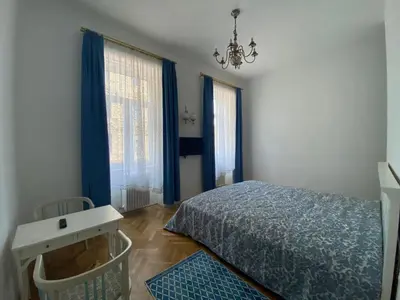 Ein Bett oder Betten in einem Zimmer der Unterkunft Klimtsuites