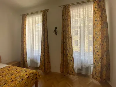 Ein Bett oder Betten in einem Zimmer der Unterkunft Klimtsuites