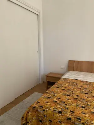 Ein Bett oder Betten in einem Zimmer der Unterkunft Klimtsuites