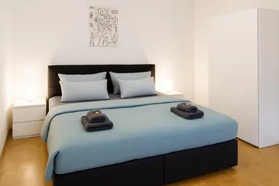Ein Bett oder Betten in einem Zimmer der Unterkunft Home Sweet Home - Stephansdom II