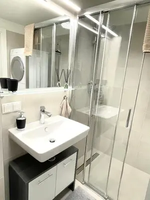 Ein Badezimmer in der Unterkunft MollArt Apartment
