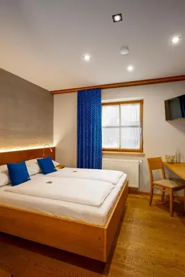 Ein Bett oder Betten in einem Zimmer der Unterkunft Winzerhof Kiss