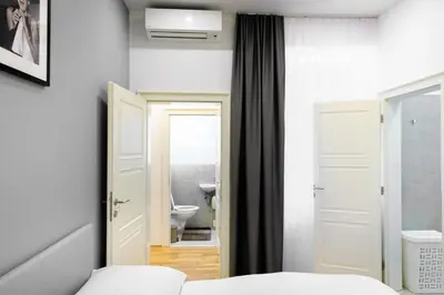 Ein Bett oder Betten in einem Zimmer der Unterkunft Lé David City Apartments 1020