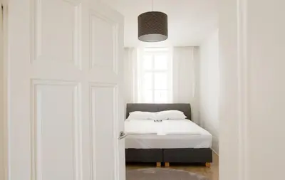 Ein Bett oder Betten in einem Zimmer der Unterkunft MINIMALISTIC STUDIO NEAR NASCHMARKT