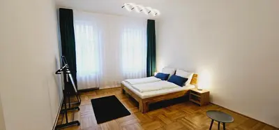 Ein Bett oder Betten in einem Zimmer der Unterkunft Vienna ROYAL Apartment - Opera