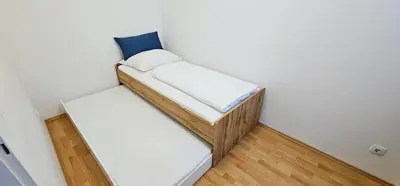 Ein Bett oder Betten in einem Zimmer der Unterkunft Vienna ROYAL Apartment - Opera