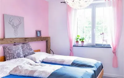 Ein Bett oder Betten in einem Zimmer der Unterkunft Schoenes Ferienhaus Hirtenberg