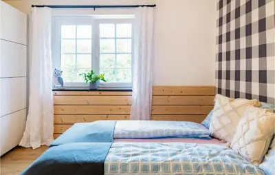 Ein Bett oder Betten in einem Zimmer der Unterkunft Schoenes Ferienhaus Hirtenberg