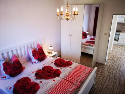 Ein Bett oder Betten in einem Zimmer der Unterkunft Ferienappartement in St. Margarethen