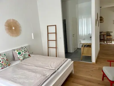 Ein Bett oder Betten in einem Zimmer der Unterkunft Pannonia Apartments