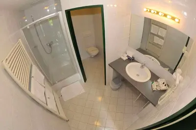 Ein Badezimmer in der Unterkunft Tennis Golf Hotel Höllrigl