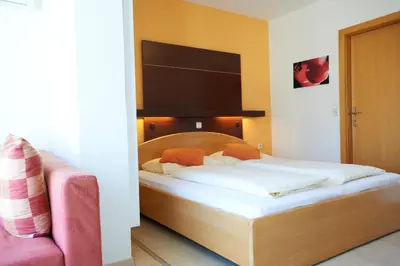 Ein Bett oder Betten in einem Zimmer der Unterkunft Gästehaus Elisabeth Weinhandl