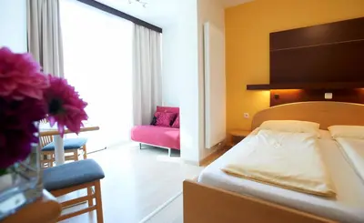 Ein Bett oder Betten in einem Zimmer der Unterkunft Gästehaus Elisabeth Weinhandl
