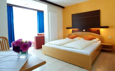 Ein Bett oder Betten in einem Zimmer der Unterkunft Gästehaus Elisabeth Weinhandl