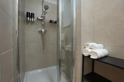Ein Badezimmer in der Unterkunft 42 m2 central bright apartment with a terrace