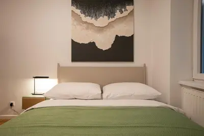 Ein Bett oder Betten in einem Zimmer der Unterkunft 42 m2 central bright apartment with a terrace